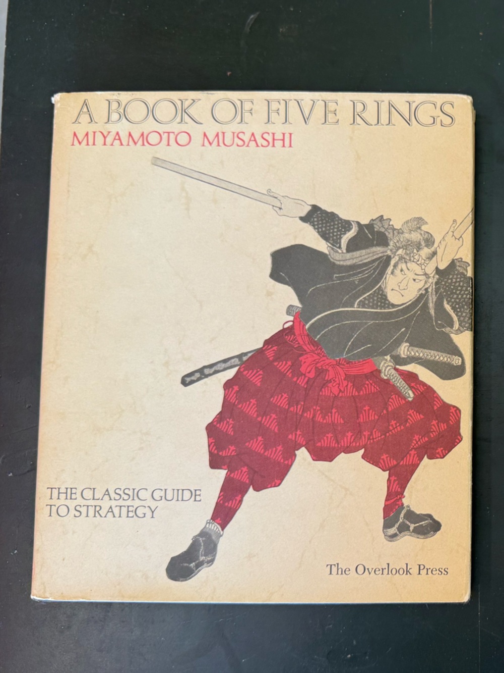 A Book of Five Rings by Miyamoto Musashi - Beige Cover with Red Illustration